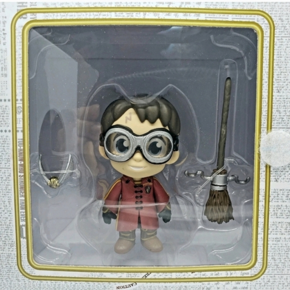 Collectible Red-Coat Wizard Figure with Broom and Goggles